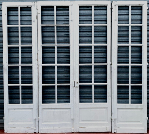 Set of four partition doors in weathered fir