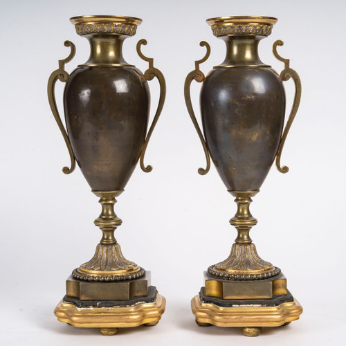 A pair of late 19th century polychrome bronze vases 