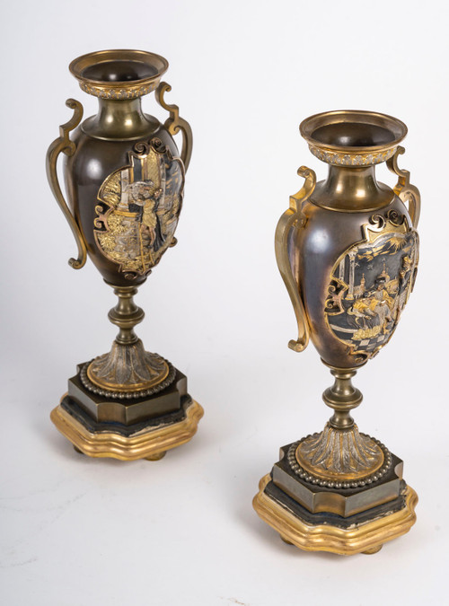 A pair of late 19th century polychrome bronze vases 