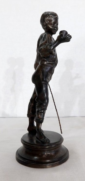  Bronze " Boy with a spinning top " - End of 19th century