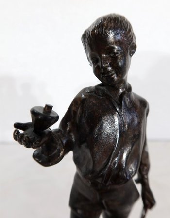  Bronze " Boy with a spinning top " - End of 19th century