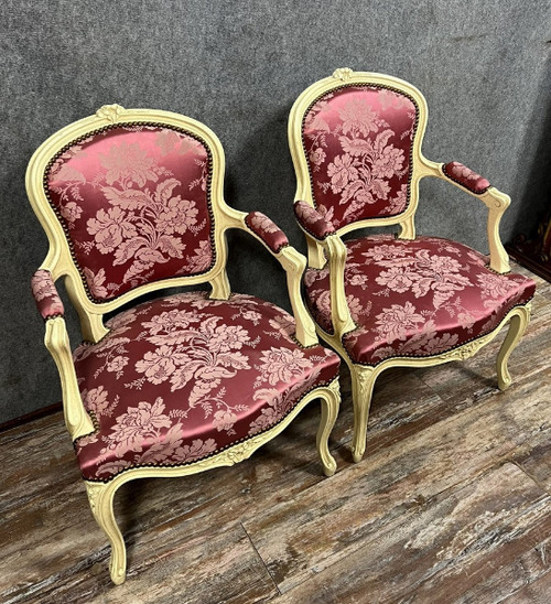 pair of Louis XV style cabriolet armchairs in lacquered and carved wood circa 1900