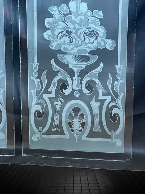 PAIR OF 1900S FROSTED AND ACID-ETCHED GLASS BISTRO WINDOWS