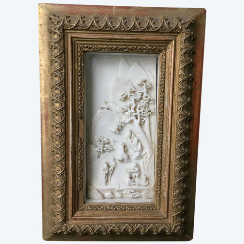 Asian village scene panel with carved and gilded wooden frame