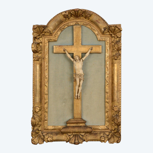 18th-century hand-carved Christ, gilded wood frame, floral decoration