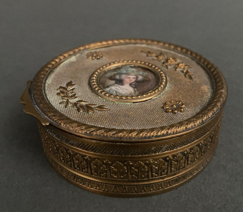 Napoleon III bronze box decorated with a miniature of an 18th-century woman.