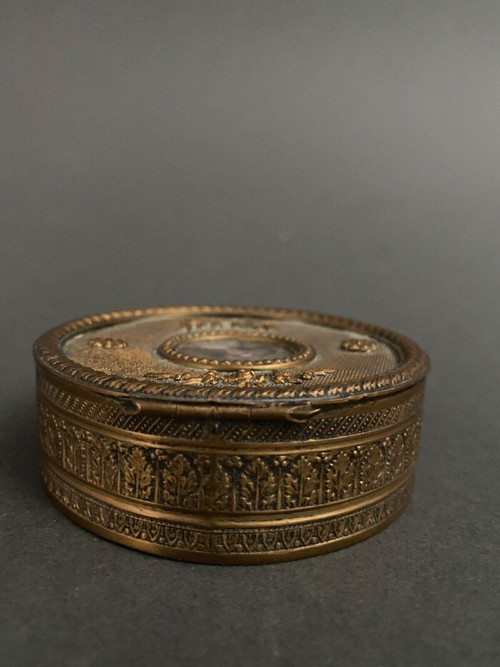 Napoleon III bronze box decorated with a miniature of an 18th-century woman.