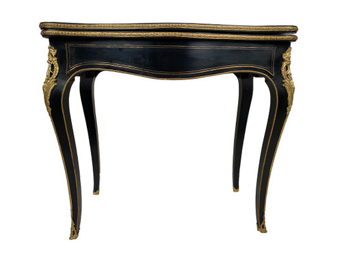 Napoleon III console forming a games table, blackened wood and brass marquetry