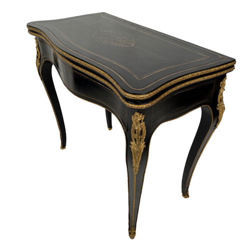 Napoleon III console forming a games table, blackened wood and brass marquetry