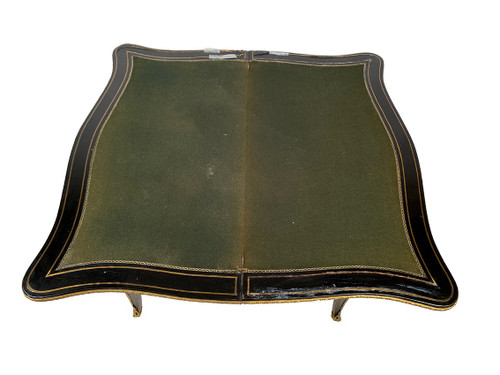 Napoleon III console forming a games table, blackened wood and brass marquetry