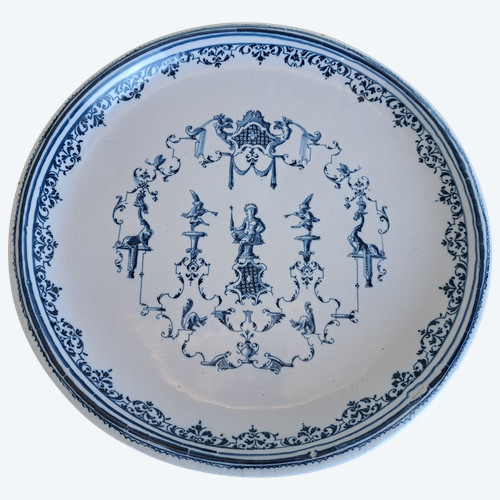 Moustiers, Mounted Plate, Berain, 18th century.