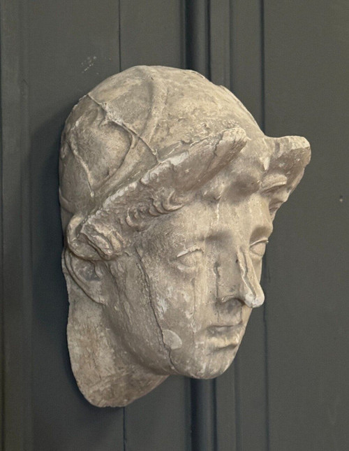 Antique plaster sculpture of a female face from the early 20th century