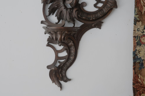  Carved oak wall lamp in the Louis XV rocaille style.