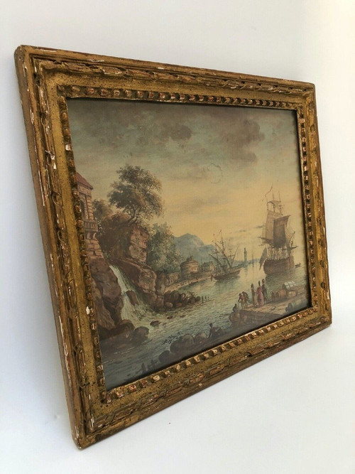 18th century watercolor of a harbor scene with waterfall and ships in a gilded wooden frame