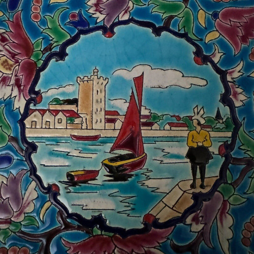 Longwy enamel dish decorated with a harbor scene