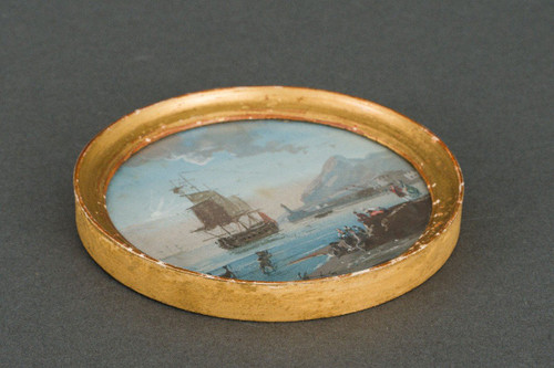 Miniature galleon and harbor scene in gilded wood frame