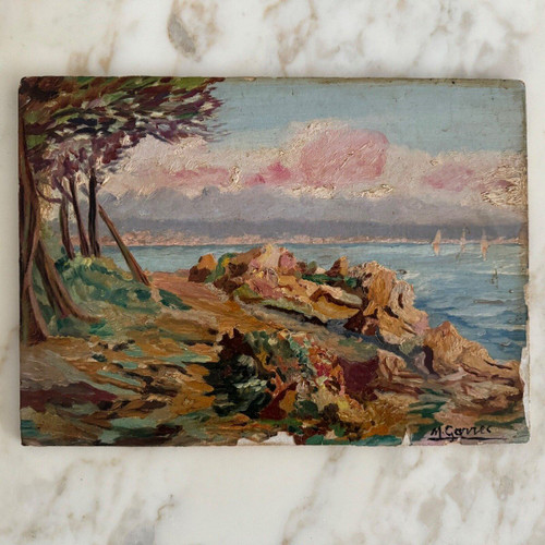 Oil on cardboard depicting a rocky coastline by M. Garrec 20th century