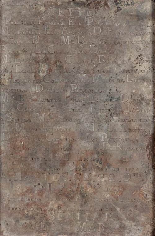 Slate-engraved stone dated 1779 decorated with names of donors