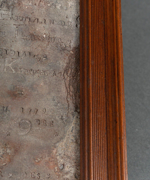 Slate-engraved stone dated 1779 decorated with names of donors