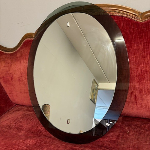 Miroir ovale moderne des années 1970 avec verre vert encadré. Très bon état, mis 78 x 62