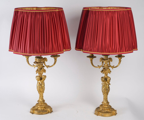 A pair of Louis XVI style gilt bronze lamps, late 19th century