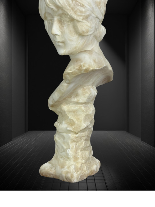 LARGE BUST OF A YOUNG GIRL SIGNED AND NUMBERED "GEORGES MORIN" IN ALABASTER