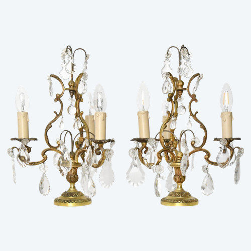 Pair of three-light gilt bronze girandoles