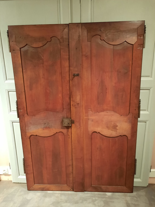 Pair of Louis XV cherrywood doors from the early 19th century.