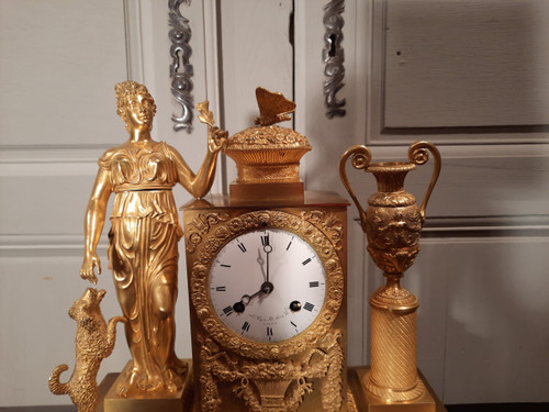 Empire period gilt bronze clock on the theme of peace and fidelity.