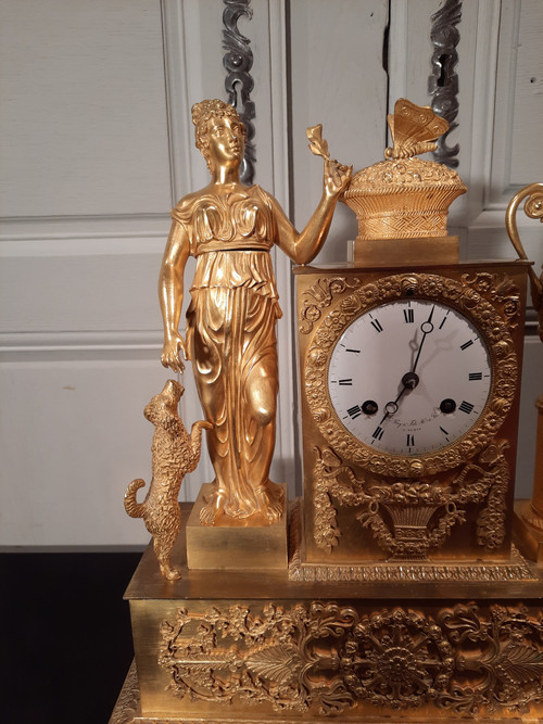 Empire period gilt bronze clock on the theme of peace and fidelity.