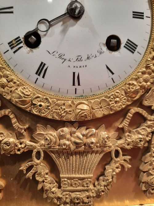 Empire period gilt bronze clock on the theme of peace and fidelity.