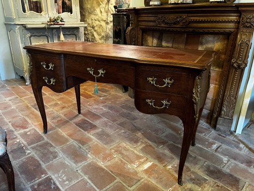 Louis XV style desk, solid oak, vignetted leather top.