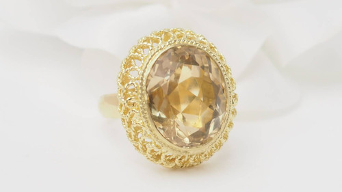 Bague filigranée en or jaune et citrine facettée