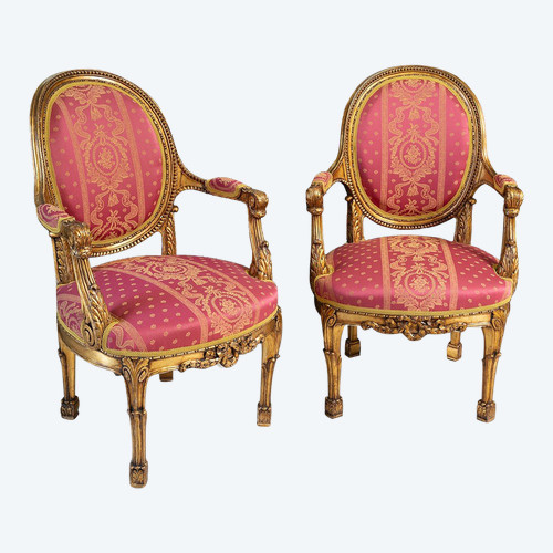 Pair of Napoleon III armchairs in gilded and carved wood. France 19th century.