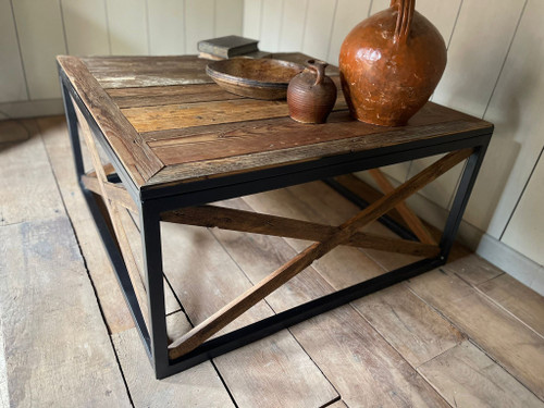 Coffee table with old castle floor on metal frame