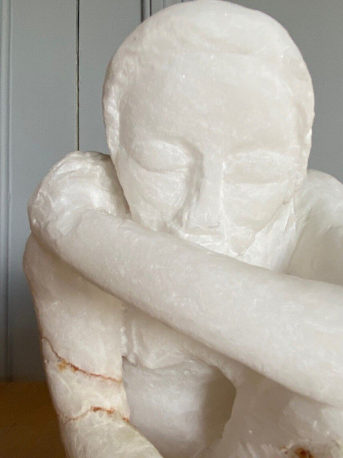 Direct-cut sculpture in onyx stone kneeling woman 20th century