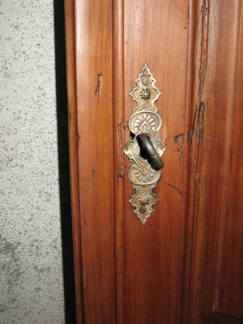 Louis XIV style molded woodwork door in cherry wood, late 18th century