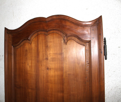 Louis XIV style molded woodwork door in cherry wood, late 18th century