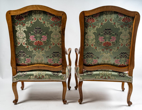 French Regence period circa 1720 Pair of large molded and carved walnut armchairs