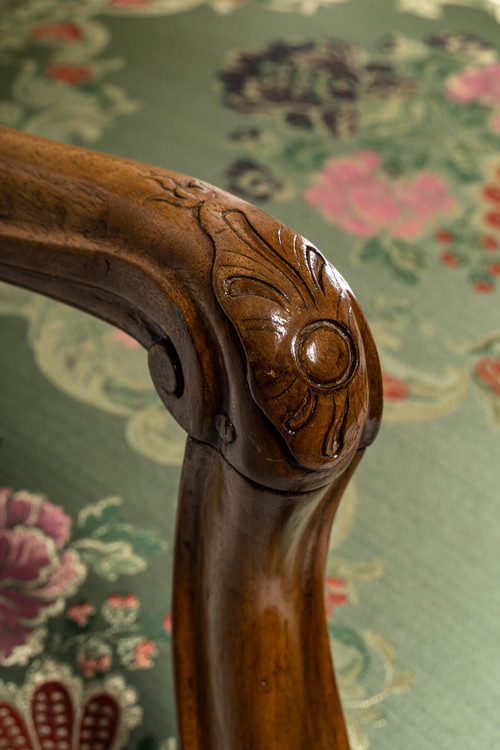 French Regence period circa 1720 Pair of large molded and carved walnut armchairs