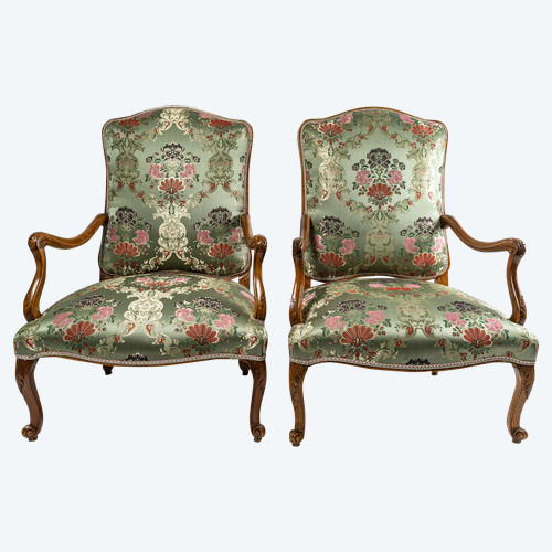 French Regence period circa 1720 Pair of large molded and carved walnut armchairs