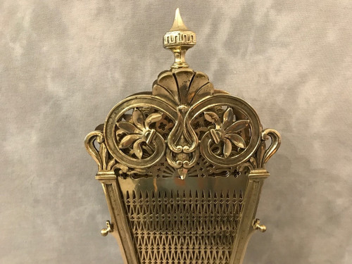 Antique bronze and brass fan-shaped mantelpiece from the late 19th century