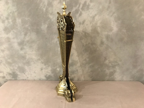 Antique bronze and brass fan-shaped mantelpiece from the late 19th century