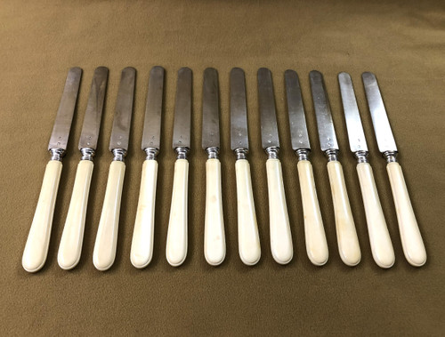 set of 12 solid silver MINERVE fruit knives with ivory handles 19th century