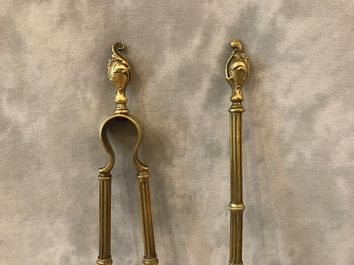 Set of a shovel and a fireplace tong in bronze and brass from the 19th century