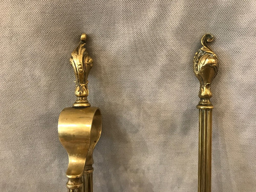 Set of a shovel and a fireplace tong in bronze and brass from the 19th century