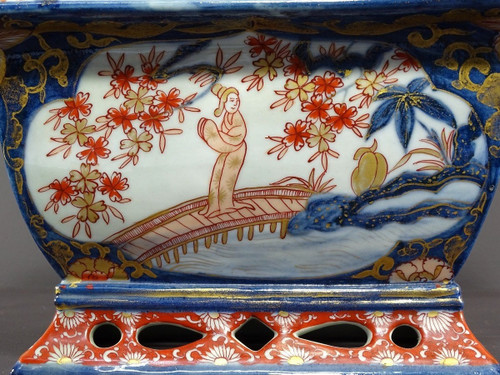 Japan, Late 19th Century, Imari Port, Porcelain Jardiniere Decorated With Animated Landscapes.