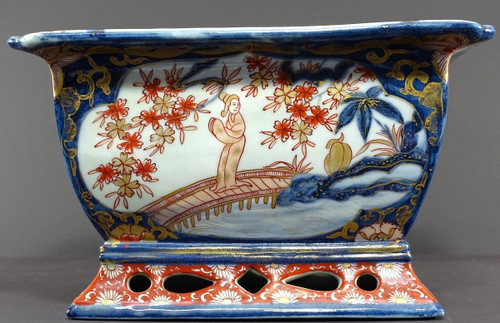 Japan, Late 19th Century, Imari Port, Porcelain Jardiniere Decorated With Animated Landscapes.