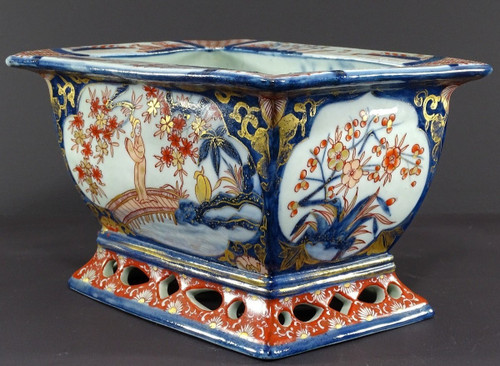 Japan, Late 19th Century, Imari Port, Porcelain Jardiniere Decorated With Animated Landscapes.