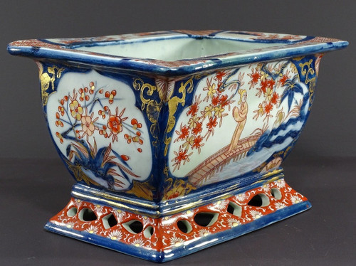 Japan, Late 19th Century, Imari Port, Porcelain Jardiniere Decorated With Animated Landscapes.